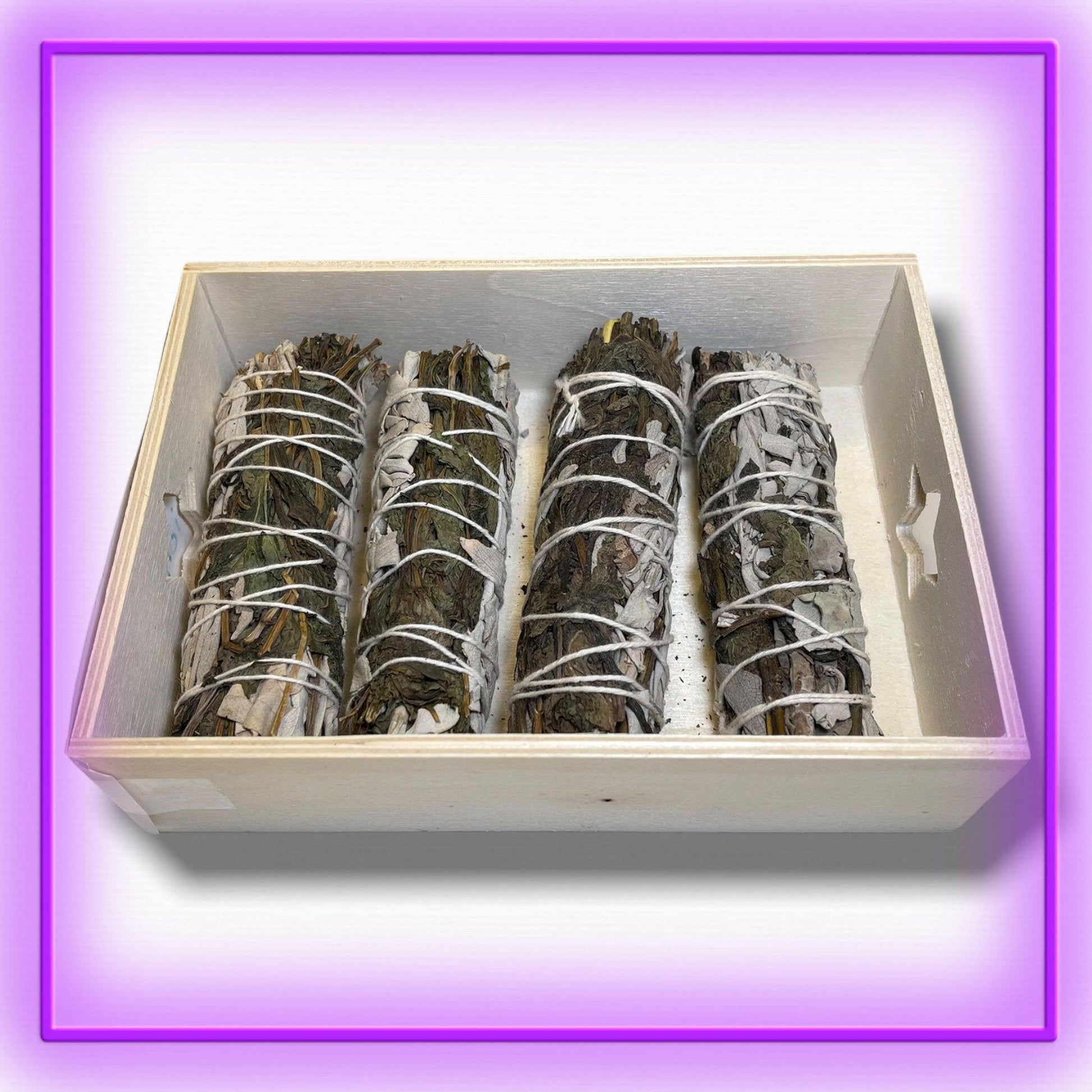 White Sage with Peppermint Smudge Stick – 4-inch sage bundle wrapped with peppermint leaves for energy cleansing, prosperity, and stress relief from Dallas Psychic & Crystals.