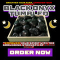 Tumbled Black Onyx stones displayed in a wooden box, glowing under mystical moonlight with the tagline “Empower your spirit with the grounding strength of Black Onyx” and a bold purple "Order Now" button. DALLAS PSYCHIC AND CRYSTALS