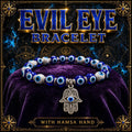 Evil eye protection bracelet with blue and white nazar beads and a silver hamsa hand charm.