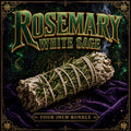 White sage smudge stick bound with sprigs of rosemary, fine needled herb tucked along the sage bundle.