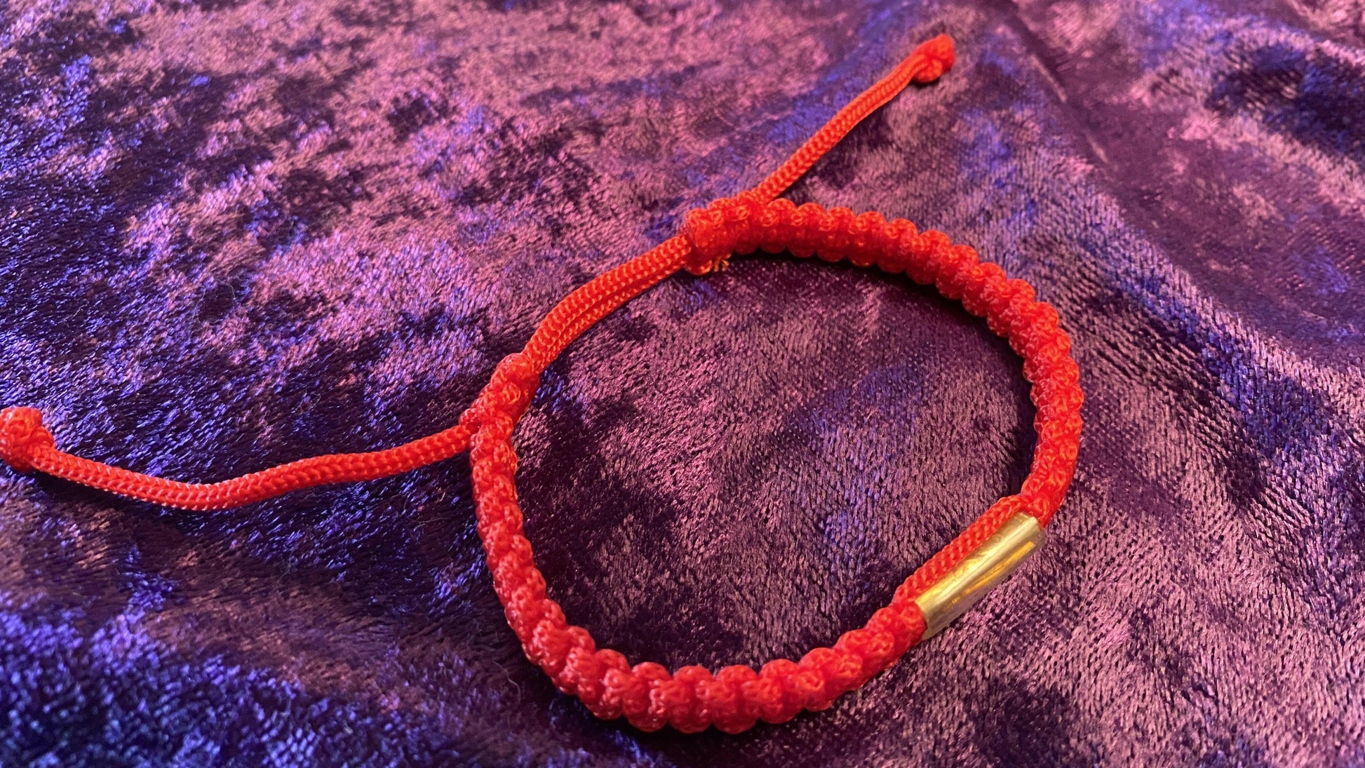 Red Rope Bracelet.