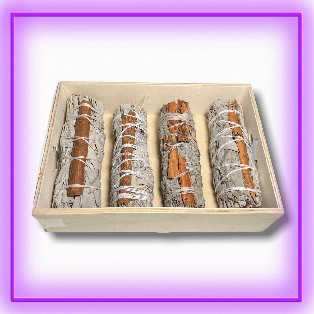 White Sage with Cinnamon Smudge Stick – handcrafted 4-inch cleansing bundle with white sage and cinnamon bark, used for protection, love, prosperity, and spiritual clearing. Dallas Psychic & Crystals exclusive.
